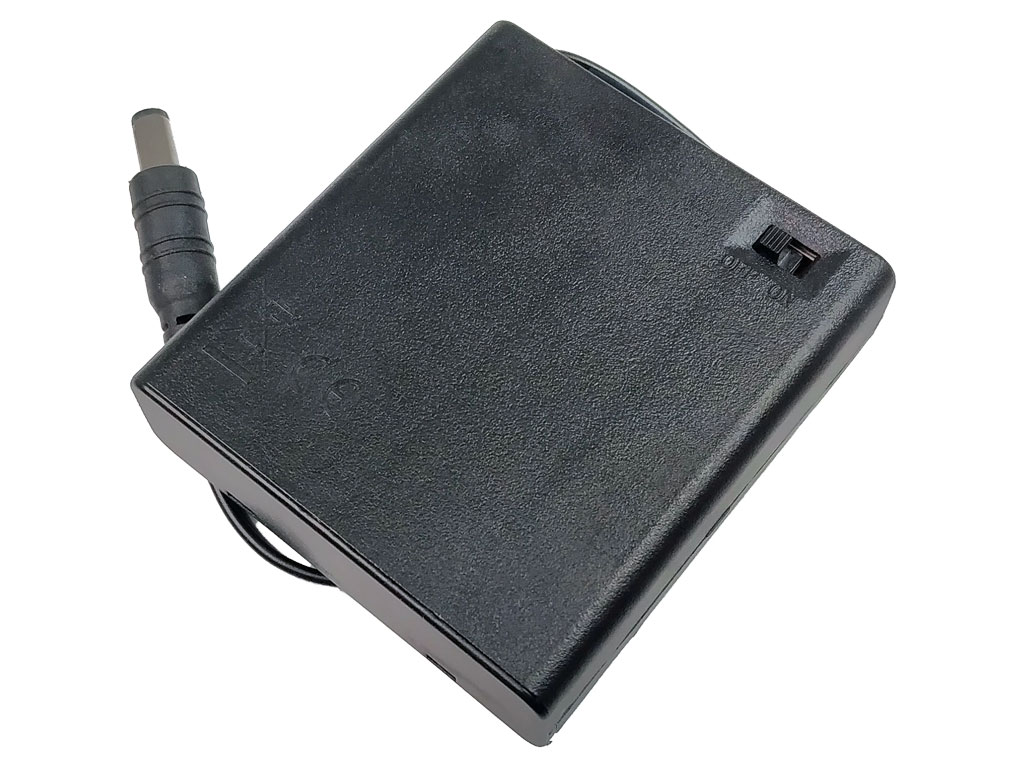 Pouzdro na baterie 4x AA vedle sebe, krabička s vypínačem, vývod vodič s konektorem 5.5 x 2.1mm