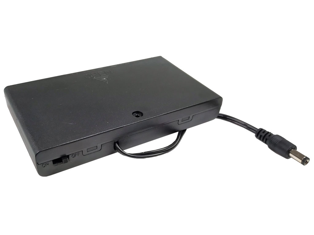 Pouzdro na baterie 8x AA vedle sebe, krabička s vypínačem, vývod vodič s konektorem 5.5 x 2.1mm